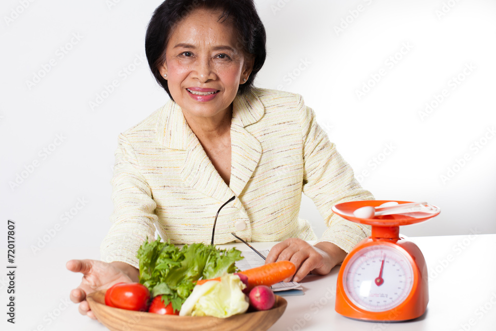 Nutritionist, A Nutritionist with a bowl of vegetable and scale Nutritionist, A Nutritionist with a bowl of vegetable and scale