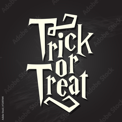 Trick or treat halloween typography quote on chalkboard
