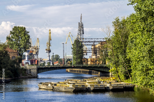 Cranes in the cargo port of Saint-Petersburg on the Admiralty s