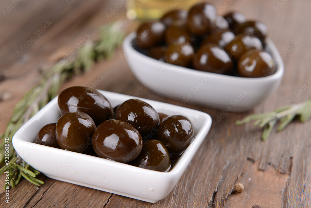 Marinated olives on table close-up Marinated olives on table close-up