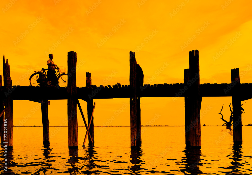 U bein bridge and sunset in Taungthaman lake, Amarapura, Myanmar