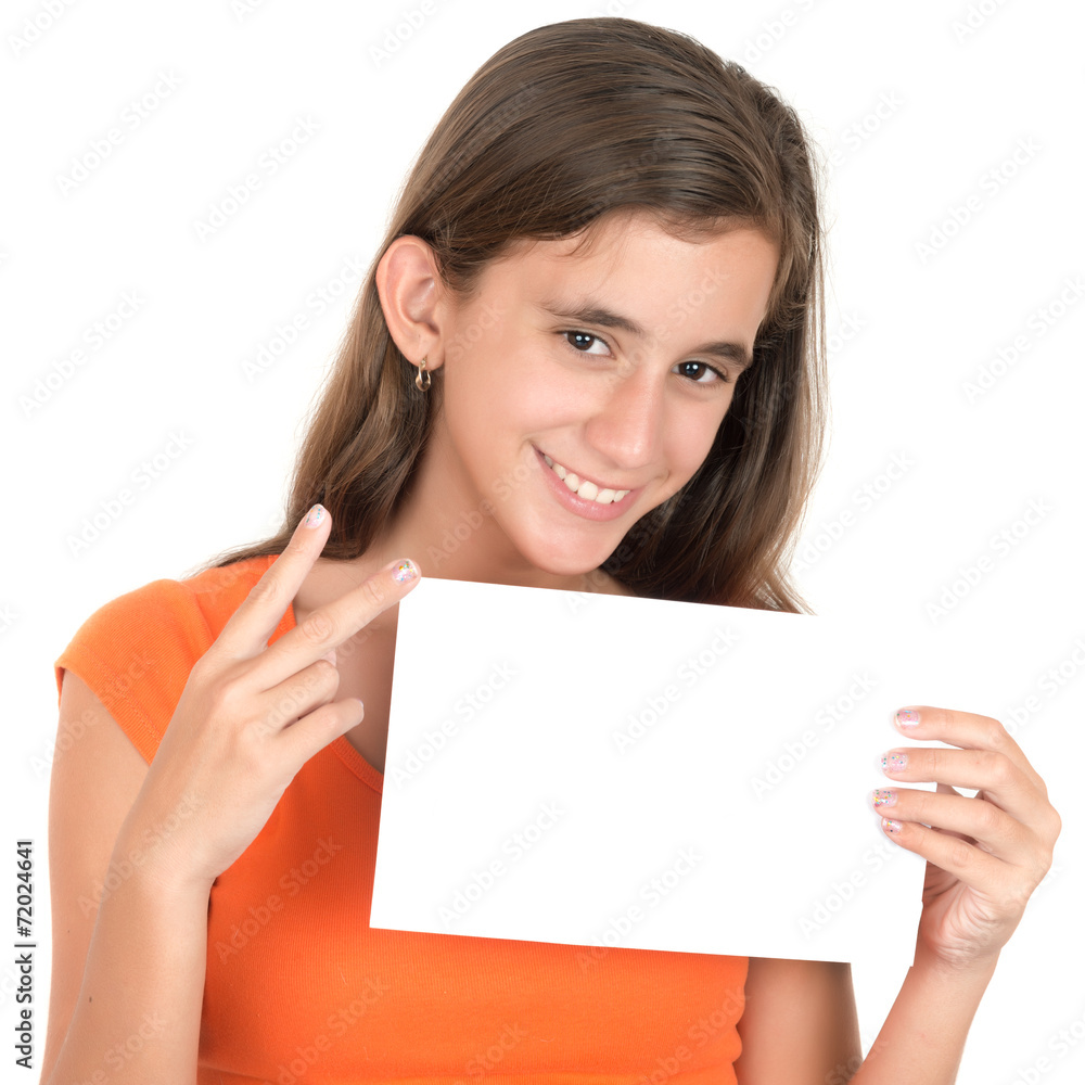 Hispanic teen holding a blank sign isolated on white Hispanic teen holding a blank sign isolated on white