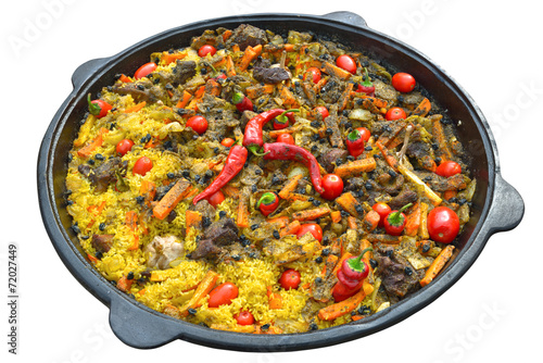 Pilaf with meat, spices, garlic and red pepper