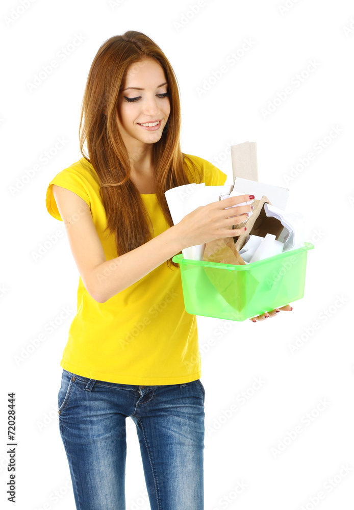 Young girl sorting paper and cardboard isolated on white Young girl sorting paper and cardboard isolated on white
