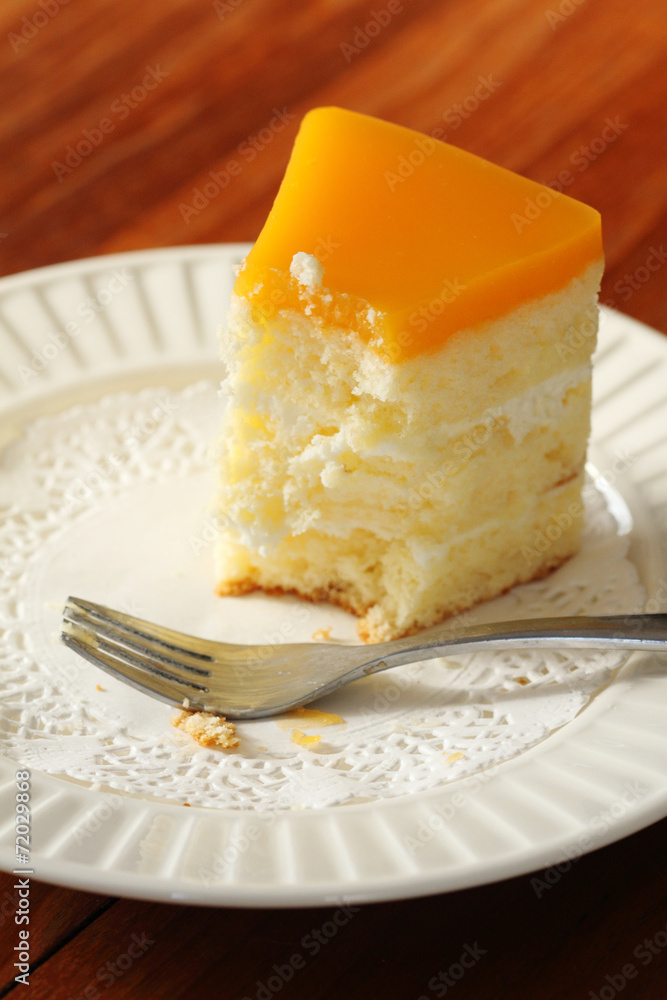 orange cake on white plate