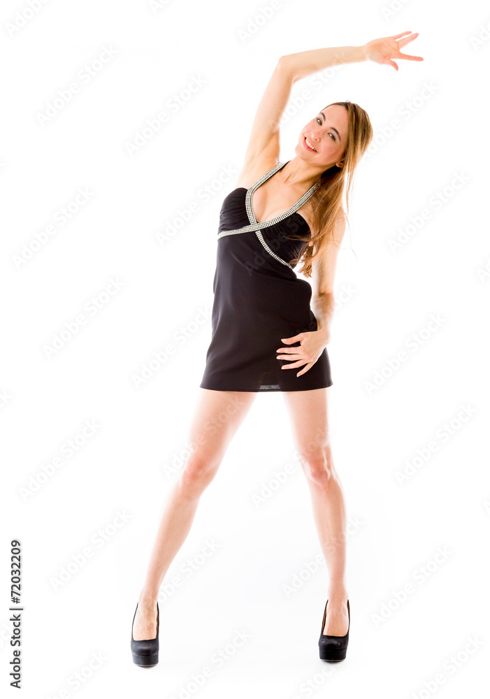 Fototapeta premium model isolated on plain background exercising stretching