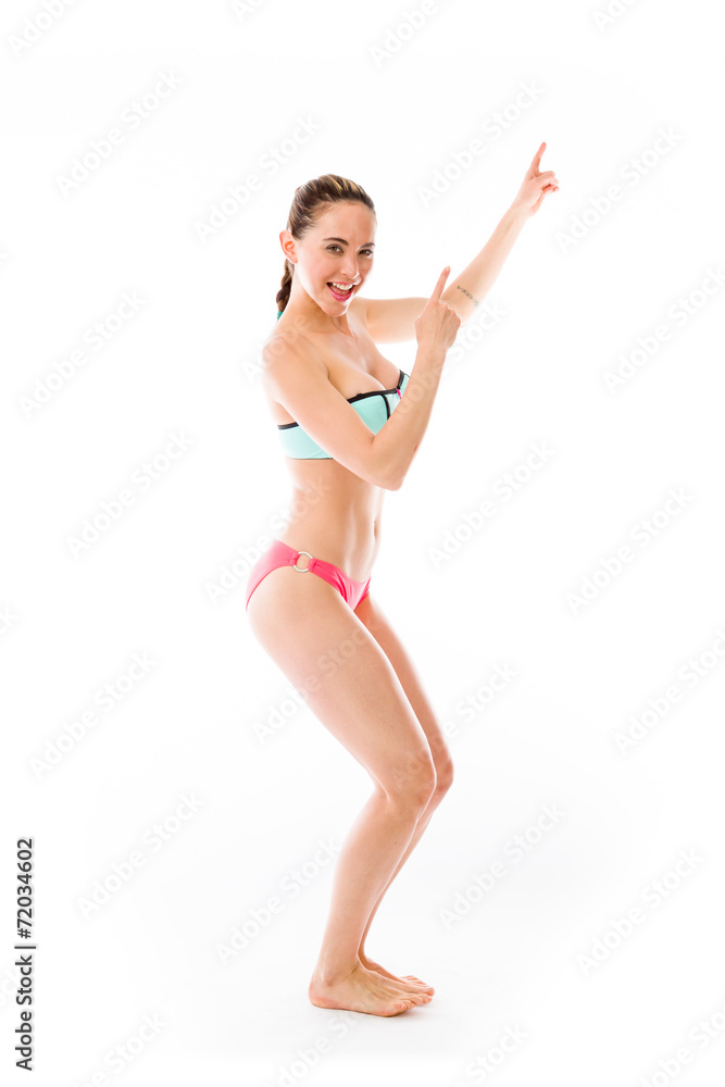 Fototapeta premium model isolated on plain background looking at camera pointing