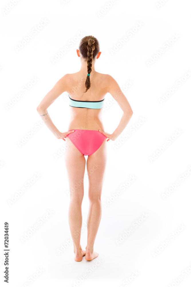 model isolated on plain background back hands on hips model isolated on plain background back hands on hips