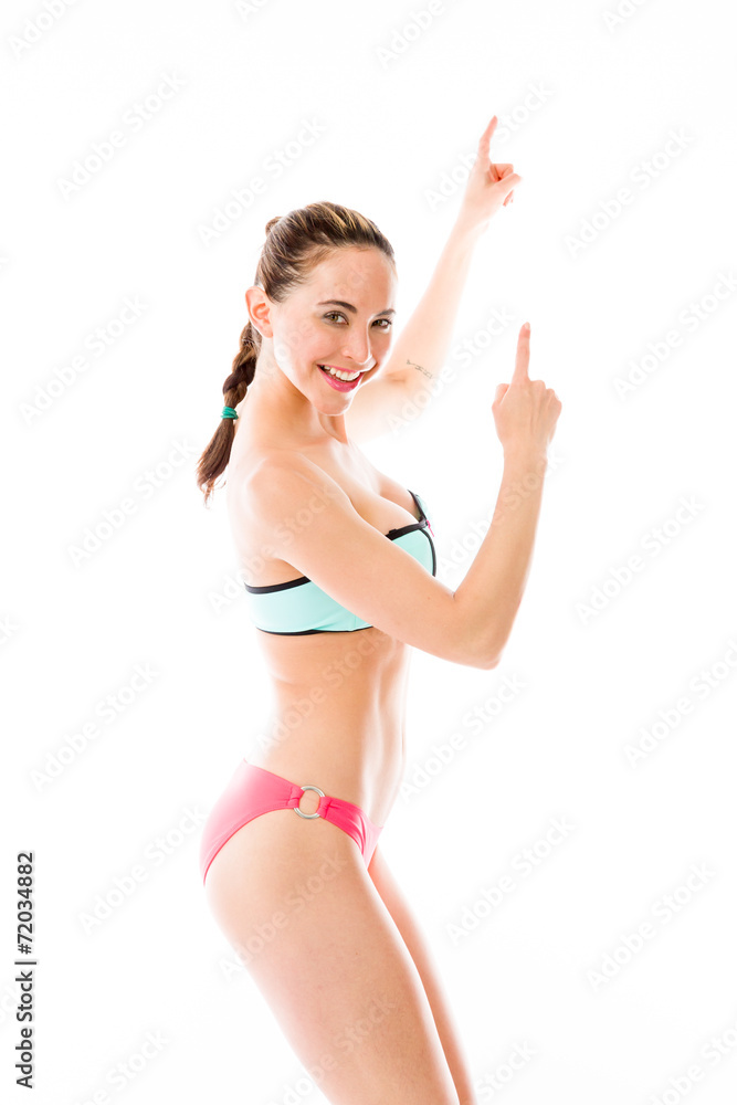 model isolated on plain background looking at camera pointing model isolated on plain background looking at camera pointing