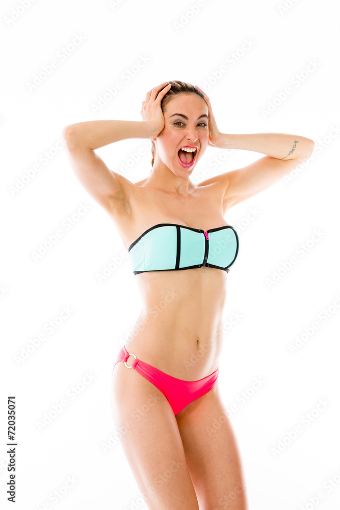 Naklejka premium model isolated on plain background stressed upset pulling hairs