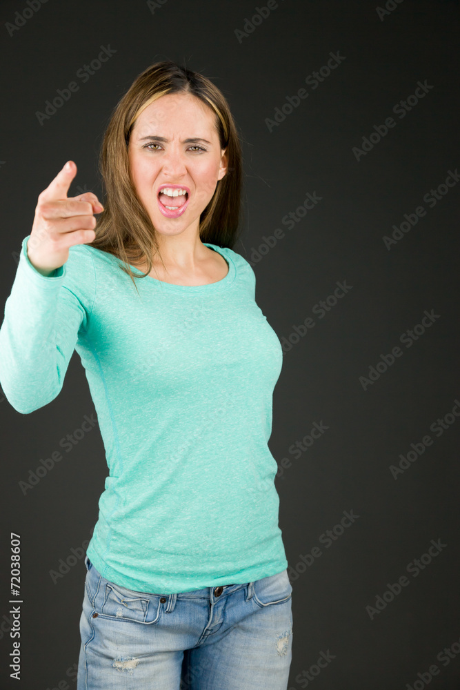 model isolated on plain background nagging scolding with finger model isolated on plain background nagging scolding with finger