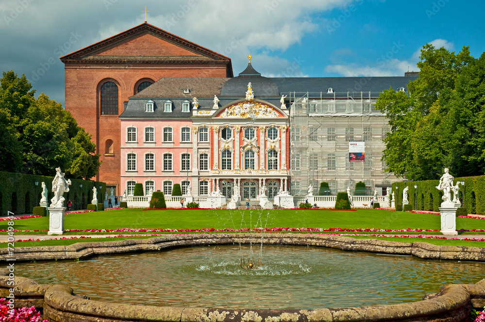 Electorate Palace and its garden with flowers in Trier, Germany