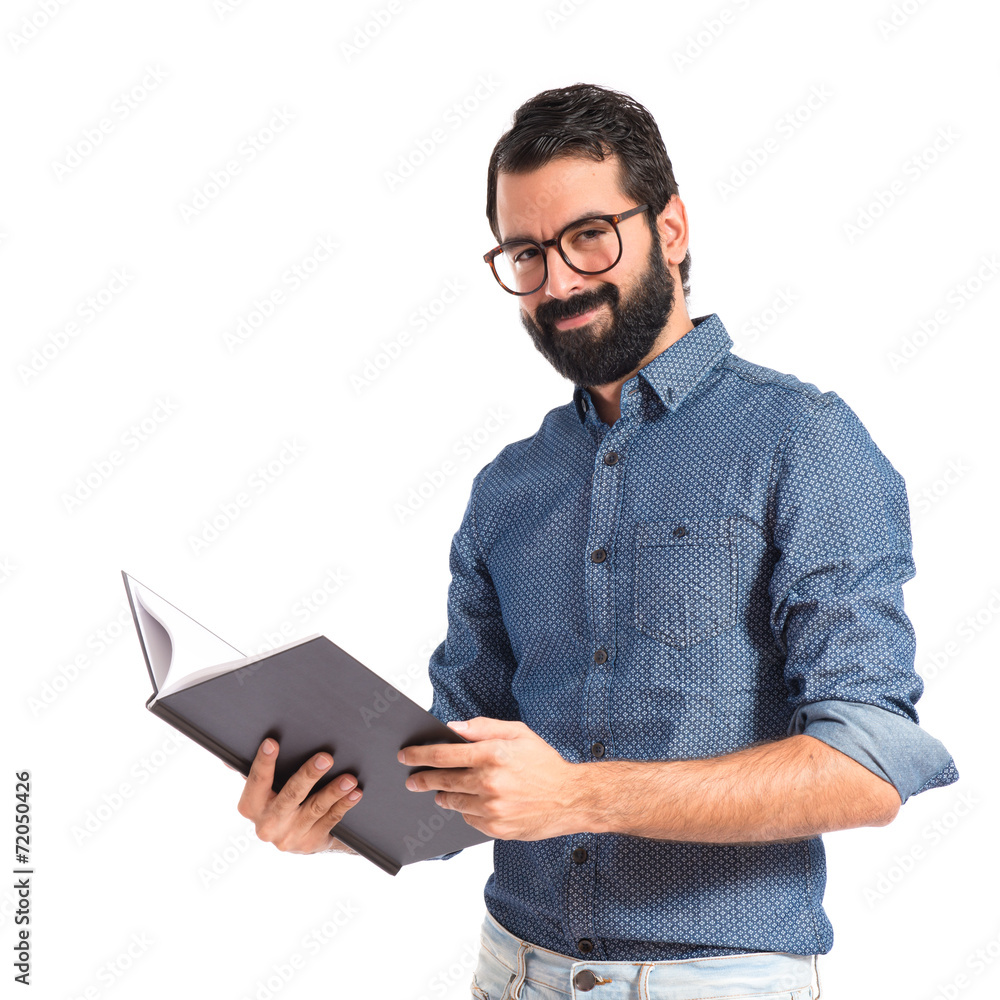 Happy hipster man reading a book Happy hipster man reading a book