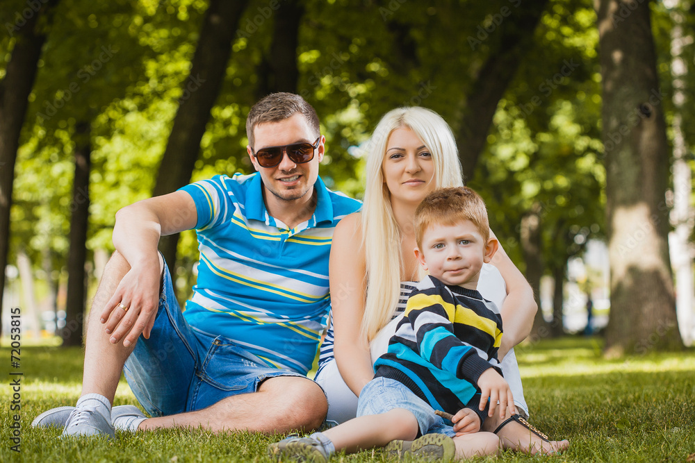 Happy family in the summer park