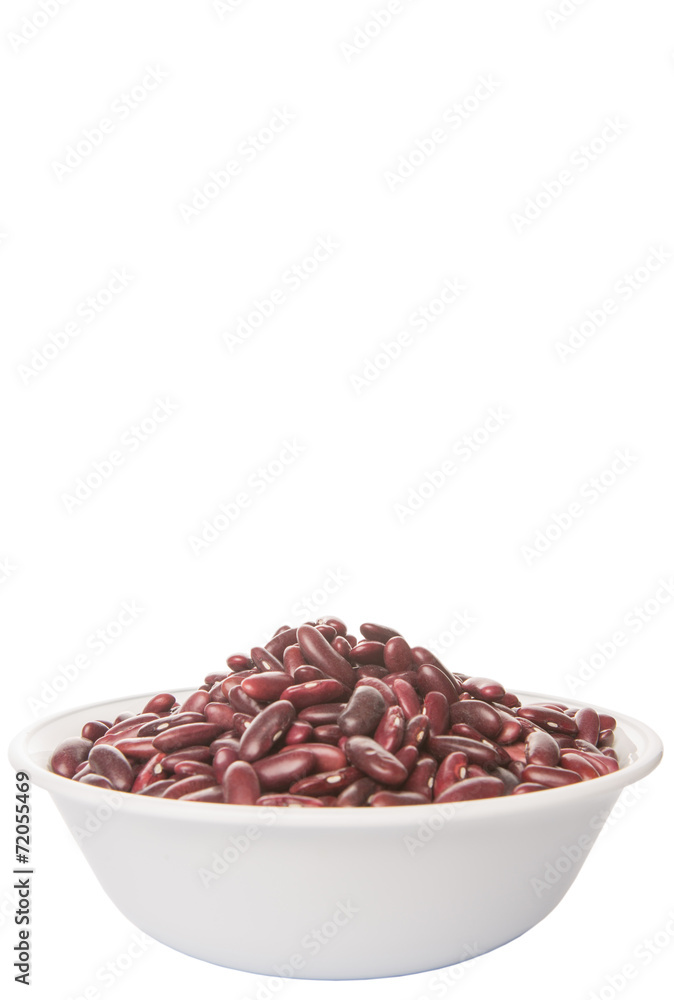 Red kidney beans in white bowl over white background Red kidney beans in white bowl over white background