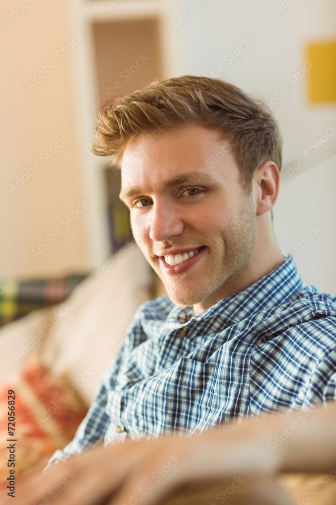 Young man relaxing on his couch Young man relaxing on his couch