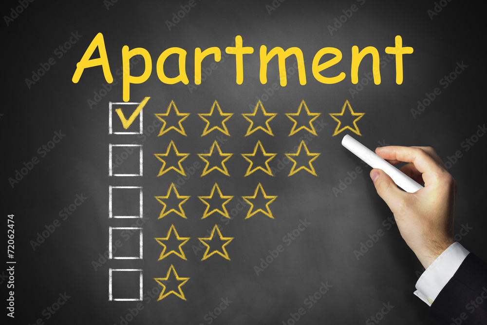 hand writing apartment on black chalkboard hand writing apartment on black chalkboard