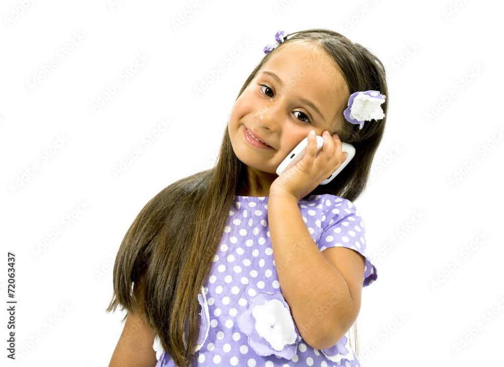 Beautiful girl smiling and holding a smartphone Beautiful girl smiling and holding a smartphone
