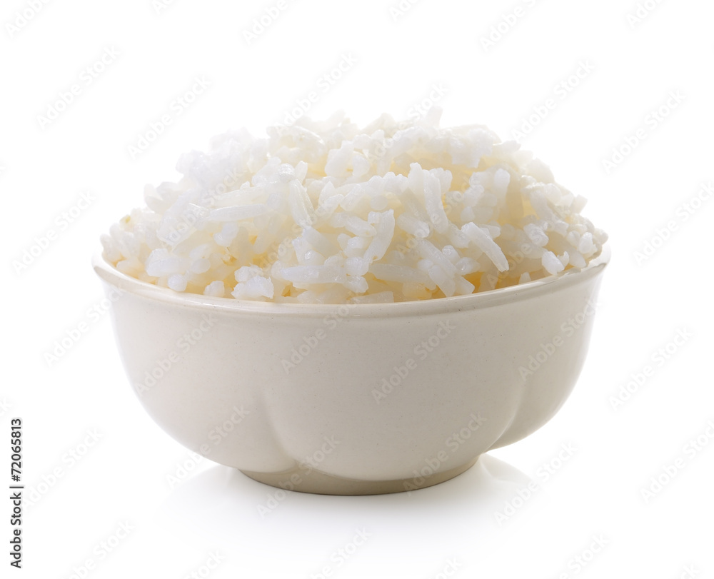 Rice in a bowl on a white background Rice in a bowl on a white background