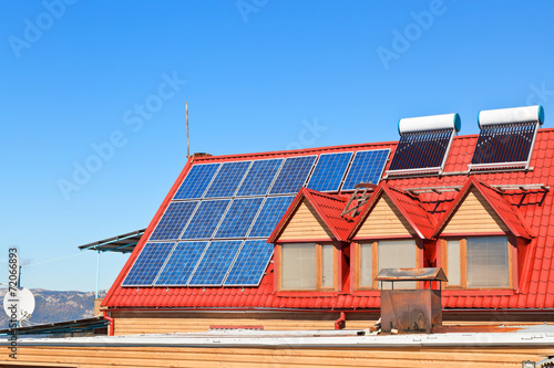 Solar Batteries and heaters on house roof
