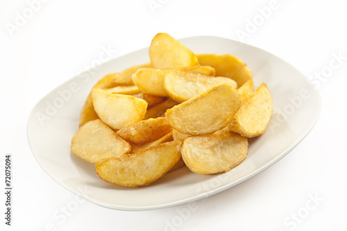 Fried potato wedges isolated white background