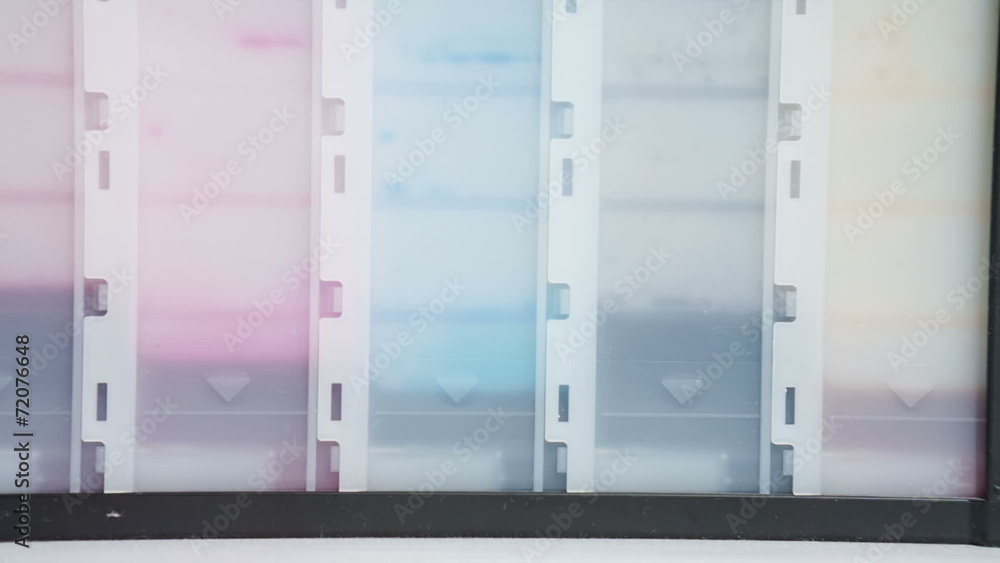 Close-up shot of a CMYK ink cartridges for color printer Close-up shot of a CMYK ink cartridges for color printer