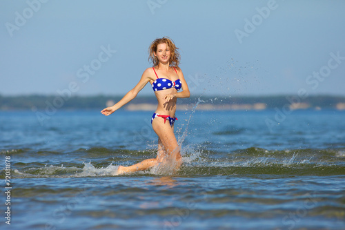 woman running in the water © zhagunov_a