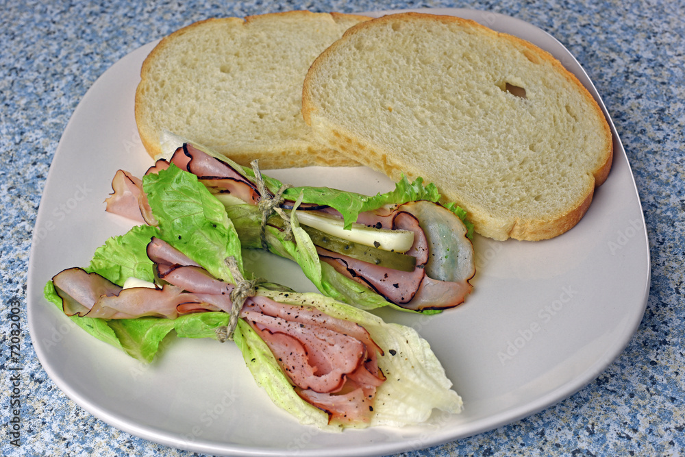 Obraz premium Elegant deli black forest ham sandwich wraps