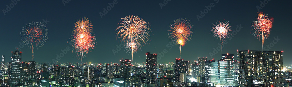 Fireworks celebrating over Tokyo cityscape at night, Japan Fireworks celebrating over Tokyo cityscape at night, Japan