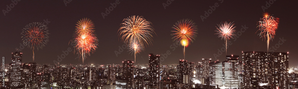 Fireworks celebrating over Tokyo cityscape at night, Japan Fireworks celebrating over Tokyo cityscape at night, Japan