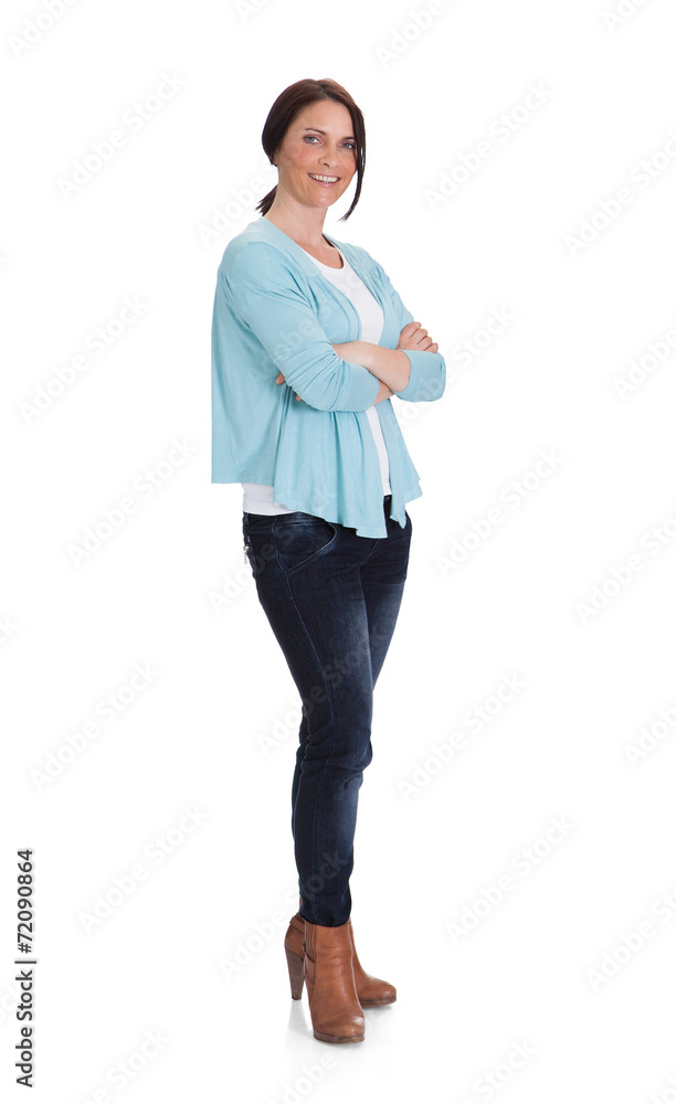 Fashionable Woman Standing Arms Crossed Over White Background Fashionable Woman Standing Arms Crossed Over White Background