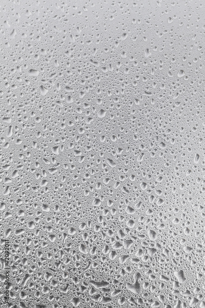 Metal surface covered in water drops. Metal surface covered in water drops.