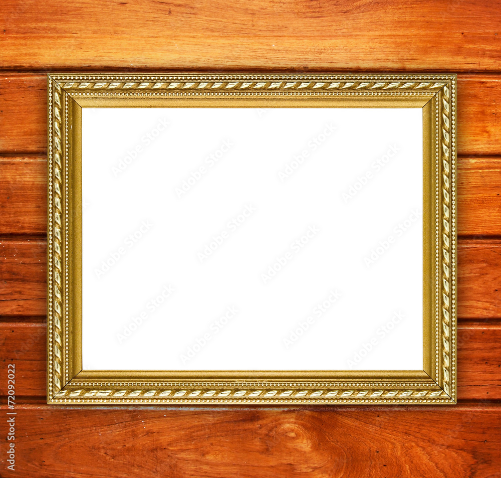 golden frame on wood wall background