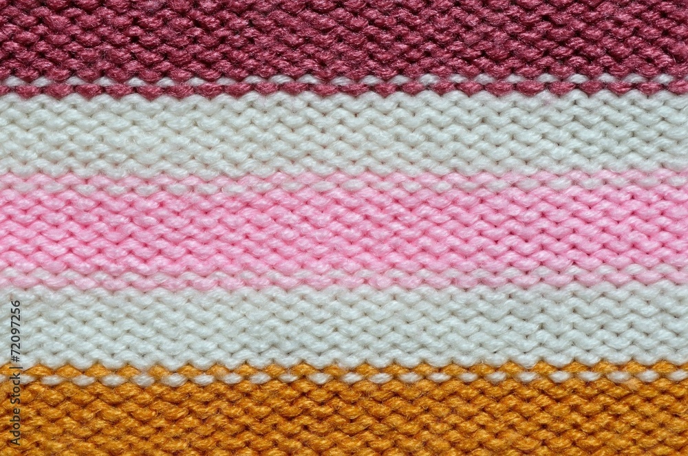 Knit woolen texture. Fabric striped background Knit woolen texture. Fabric striped background
