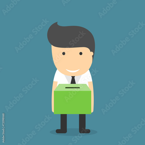 Businessman holding box