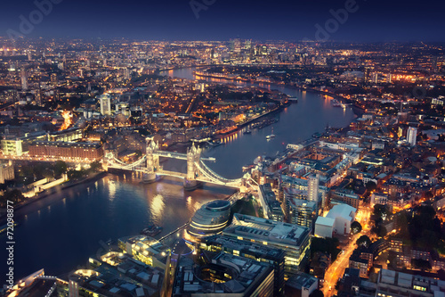 London at night with urban architectures and Tower Bridge © Iakov Kalinin