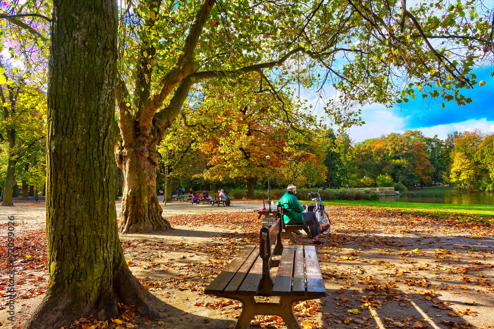 Fototapeta premium People sitting in park
