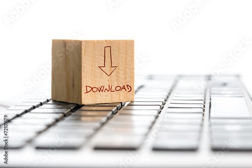 Obraz na plátně Download Text with Arrow on Cube Above Keyboard