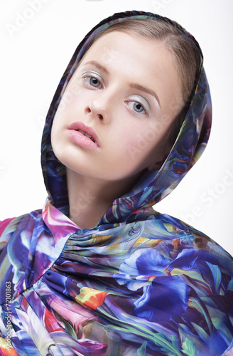 Urban Fashion. Portrait of Teenager Girl in Blue Hood