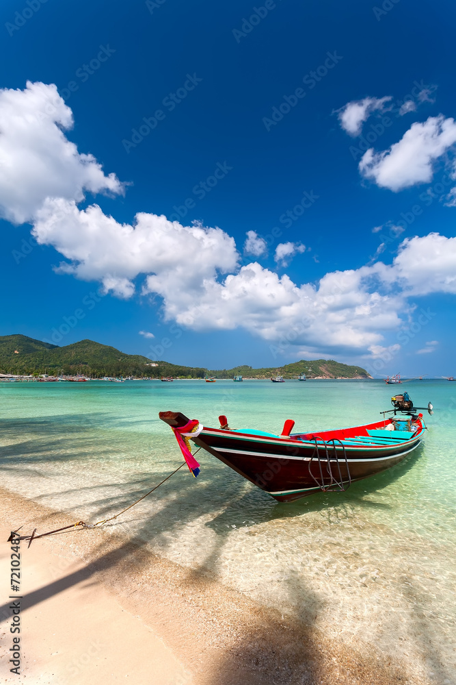 the fishing wooden boat in harbor