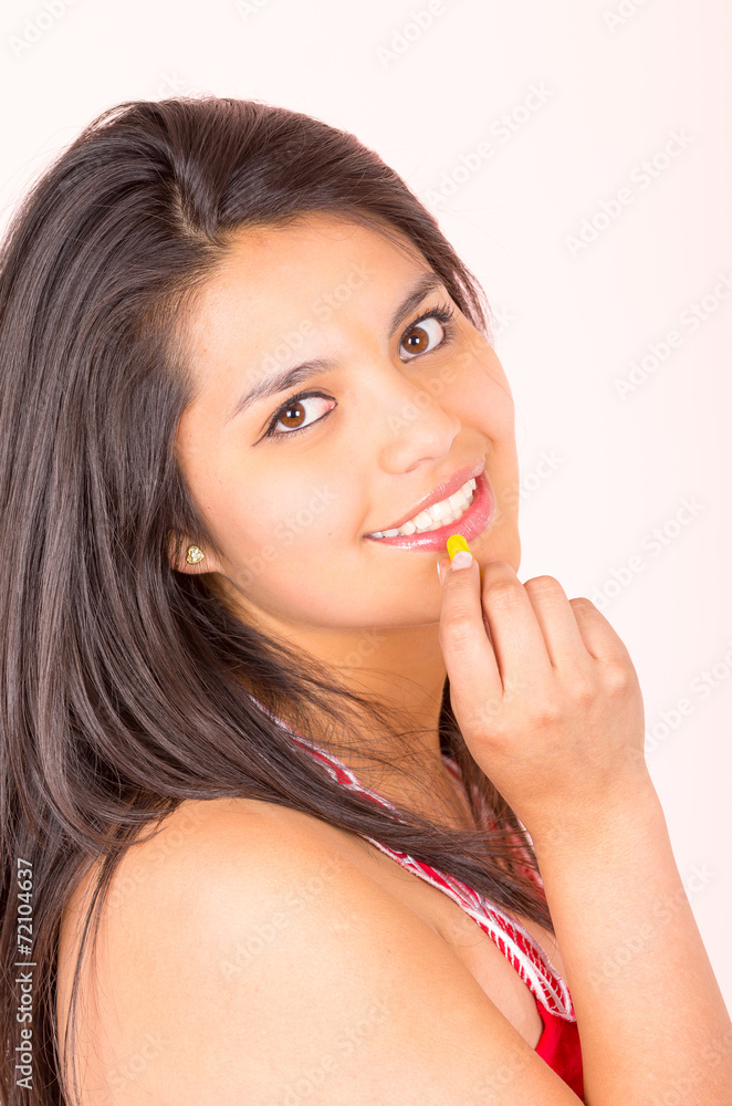 beautiful young hispanic girl eating candy sweets caramel beautiful young hispanic girl eating candy sweets caramel