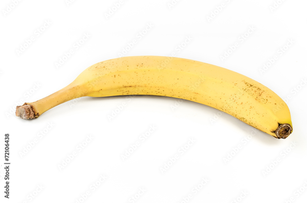 Single banana against white background Single banana against white background