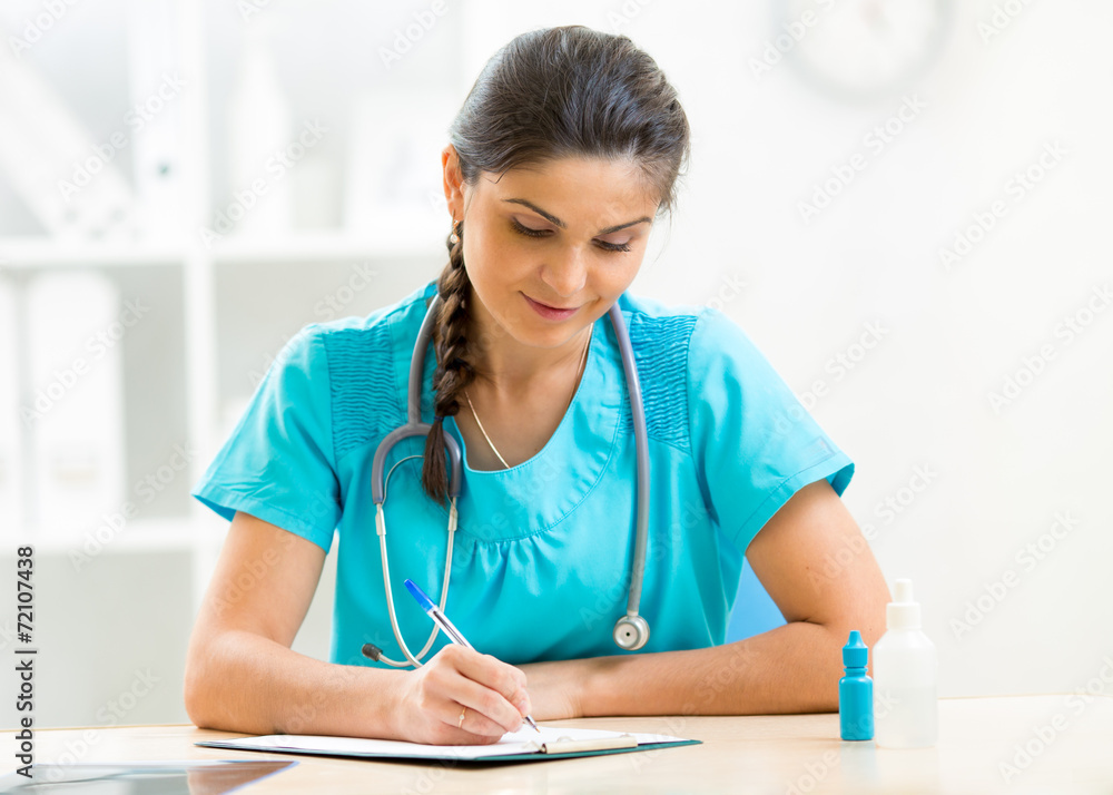 cute physician woman working in her office cute physician woman working in her office