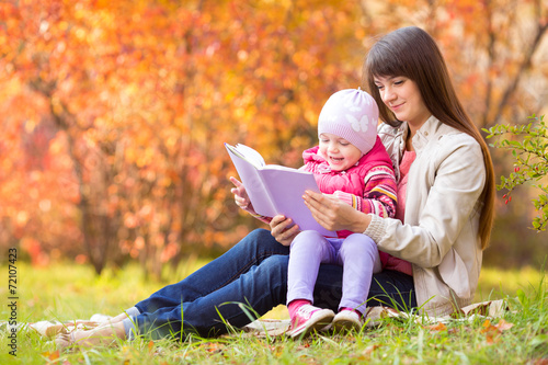 mother and kid read a book ...