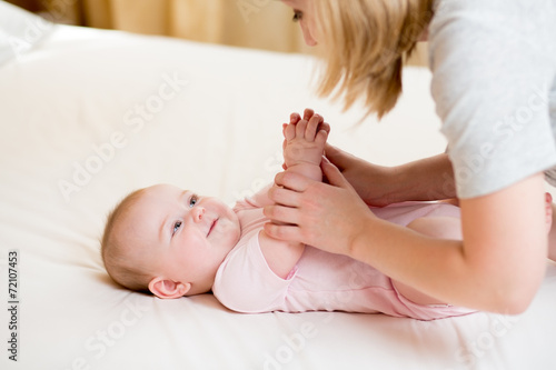 mother massaging or doing g...