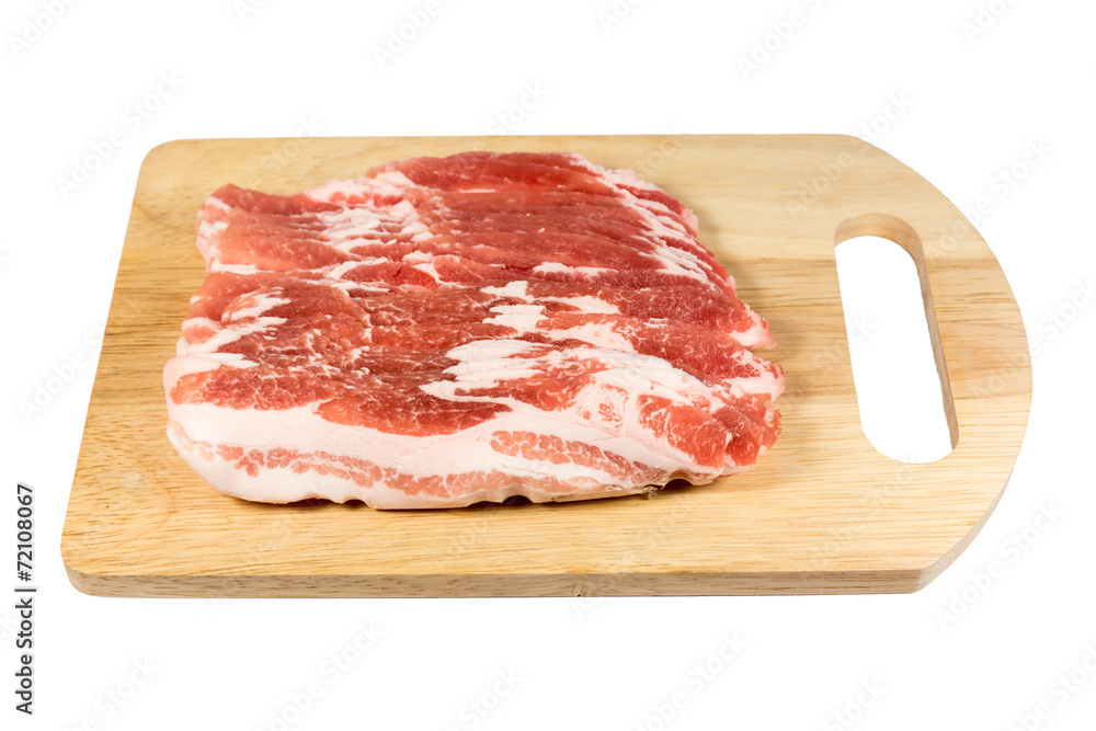 pork belly slice on a wooden board