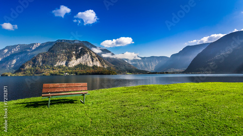 Wooden bench near the lake ...