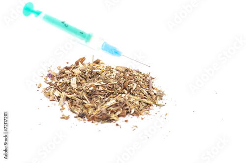 Fotografie Tobacco and syringe on white background
