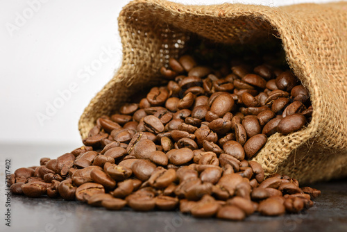 Studio shot of coffee beans in a bag © Canvas Alchemy