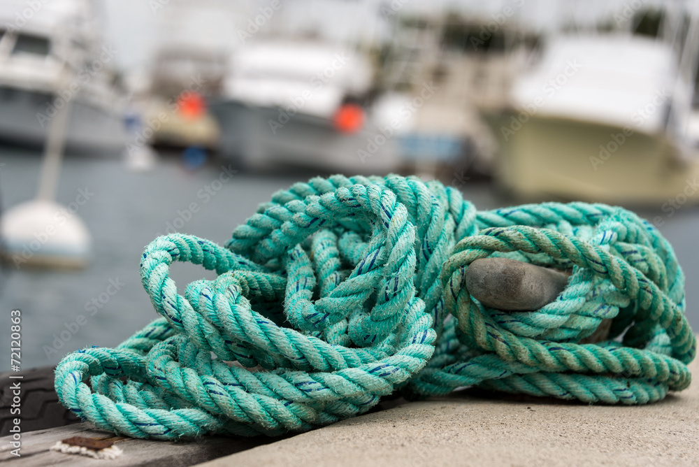 Green rope closeup in harbor